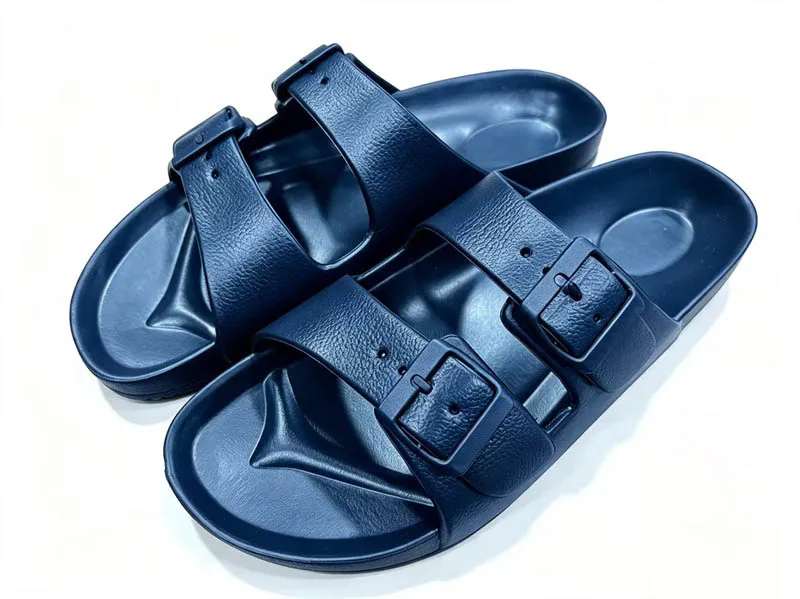 เหตุใดรองเท้าแตะสไลด์ EVA หัวเข็มขัดคู่แบบปรับได้ Unisex จึงได้รับความสนใจ